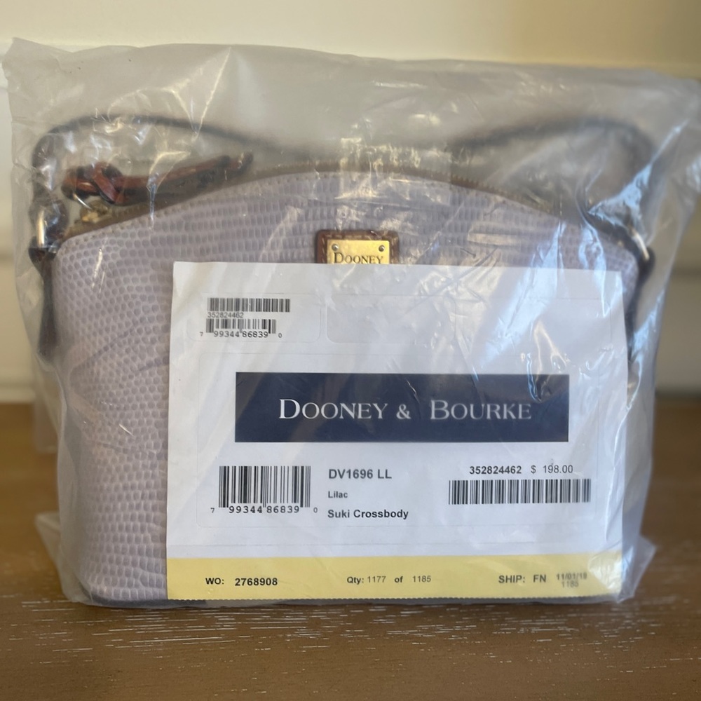 New Never used. Dooney & Bourke Lilac 
Suki Leather Crossbody Bag. Hello Spring!